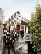 In 2010 his partner, Yosh Asato, moved in, and in 2013 he finished a net zero guest cottage on the property.