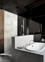 Bath Room, Concrete Counter, Drop In Tub, Concrete Wall, Open Shower, and Concrete Floor The en suite tub is by Kaldewei, the mixer is by Tonic, and the spout is by Sussex Taps.  Photo 5 of 10 in A Richly Furnished Home Frames Striking Landscape Views