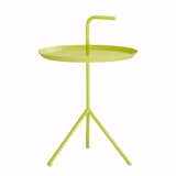 Designer Thomas Bentzen designed the DLM Table for Danish design studio HAY to blend the necessity of a side table with the portable functionality of a tray. The DLM acronym means “Don’t Leave Me,” which is a clever call to the table’s function. The round side table features an easy-to-grab handle that comes out of the center of the table, making it easy to carry the DLM with you around the house.  Photo 2 of 7 in Stylish Side Tables by Marianne Colahan