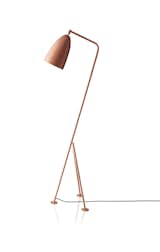 Designed by Greta Grossman, the iconic Gräshoppa series was first produced in 1947. Influenced by European Modernism, the lamp balances minimalism, high function, and distinctive personality. The Gräshoppa Floor Lamp is characterized by its angled stand and tripod legs, which appear almost like a grasshopper poised on its legs, ready to jump.