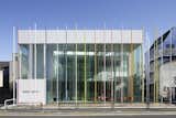 Sugamo Shinkin Bank, Ekoda Branch (2012)

Another branch of the Sugamo Shinkin Bank features 29 tall exterior poles and 19 in the entryway, blurring the boundary between indoors and outdoors.  Photo 7 of 10 in French Architect Brings Brilliant Color to Tokyo