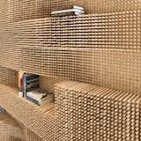 This one's quite literally a "pegboard" so we had to throw it in. An undulating wall made from over 40,000 dowels adds a dose of awe to a Massachusetts loft.  Photo 5 of 7 in Functional and Quirky Uses for Pegboard by Zach Edelson