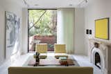 In search of a more modern space to hang her paintings, the owner of this sprawling three-story 19th-century Manhattan town house enlisted architects Anne Marie Lubrano and Lea Ciavarra to give her home a tasteful renovation.