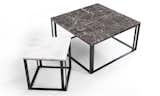 The Iota side tables are topped with black or white marble.