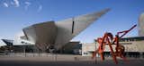 Denver Art Museum Extension

Libeskind designed a titanium-clad addition to the Denver Art Museum that resembles the peaks of the Rocky Mountains and geometric rock crystals found in the foothills near Denver.  Search “extension” from Welcoming Keynote Speaker Daniel Libeskind to Dwell on Design NY