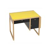 A modern reconstruction of Josef Albers original 1927 design, this writing desk was built for the Moellenhoff family. Although their home was destroyed in the war, this piece, along with Albers’ famous nesting tables, was saved and brought to the United States prior to the outbreak of World War II. Nearly an exact copy of the original desk, the writing desk is made of solid oak with a yellow lacquered glass top, black lacquered drawer fronts, brass hardware, and an oak side panel that can be raised to create a larger work space.