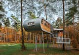 Treehouse by Baumraum, Belgium

Andreas Wenning's firm Baumraum counts over 40 houses, sited in both rural and urban locales, in its portfolio. To reduce impact at this forested site, Baumraum prefabricated a treehouse and craned it atop 19 steel columns, arranging it so that the surrounding trees’ roots wouldn’t be harmed.