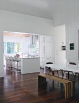 Kitchen, White Cabinet, and Marble Counter Bates Masi designed the two-inch-thick Carrara marble countertops and white fiberboard cabinetry in the kitchen.  Photo 5 of 12 in Art-Filled Hamptons Vacation Home