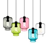 This colorful assortment of Calla Pendant Lights from Niche Modern is made of hand-blown glass in Beacon, New York. Inspired by calla lily flowers, the pendant lights can be used to showcase the Plumen 001 Bulb.