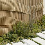 Outdoor, Vertical Fences, Wall, and Pavers Patio, Porch, Deck Sedums seem to encroach on white Napa Cast Stone pavers. As one moves from the poolside courtyard to the secluded deck below, the landscape transitions to larger succulents and then to sculptural South African euphorbias and podia.  Photo 2 of 2 in garden space by laurent paméla from A Spa-Like Patio with Stunning Views Cascades Down a Los Angeles Hillside