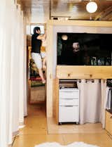 Woody camper trailer with birch plywood floors and storage
