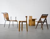 Architect Lina Bo Bardi embraced the vernacular design traditions while pushing new forms forward. Her use of not only wood but fabrics and leathers stand out in several of her designs. Her furniture was often designed only for her buildings. This group of chairs was created between the 1950s and the 1980s.  Photo 3 of 5 in Bring the Best of Brazilian Modernism to Your Home with This New Book by Matthew Keeshin