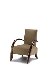 The Cloud Lounge chair features sweeping mahogany arms.