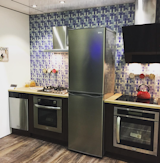 Haier shared a tiny kitchen with built-in, 24-inch appliances, perfect for small living in NYC.