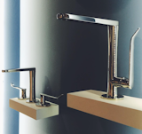 Cooper & Graham displayed sleek faucets designed by Yabu Pushelberg.