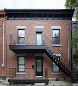 At the city’s request, the design at the front of the home did not receive a major change—which included keeping the duplex’s stairs. "Everything is restored, but in a way that is respectful," Blouin said.
