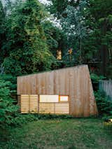 In a chaotic stretch of Brooklyn, architect Nicholas Hunt built a 55-square-foot reprieve from the bustle in his own backyard. The studio, crafted with salvaged fence pickets and cedar planks, is crowned with a Plexiglas skylight.