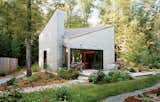 An artist by trade, and gardener by passion, Allison Paschke commissioned Providence-based architecture firm 3SIXØ to build a modest cottage that would allow her to reconnect with nature. She landscaped the home’s lush gardens herself.