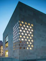 Kister Scheithauer Gross Architects designed a laser jet-cut Star of David pattern for the facade, which creates a corner window in the sacral room housing the Torah.&nbsp;
