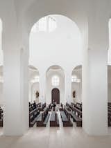In 2013, dedicated British minimalist John Pawson tackled the interior renovation of the 1,000-year-old St. Moritz Church in Augsburg, Germany. While the layout remains traditional, modern touches like a thin onyx coating in place of stained glass add a luminescence that underscores the beauty of the traditional apses.  Photo 6 of 21 in You Won't Believe That These Incredible Modern Buildings are Chapels and Synagogues