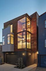 “Church Street is a pretty busy through street, [and] now everyone knows the ‘rusty steel house,’” Zack says. The front unit’s exterior is made of acrylic stucco, custom wood siding, and Cor-Ten steel.