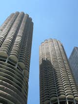 Often likened to corncobs or honeycombs, each Marina City tower has 19 levels of open-air garage parking beneath 40 levels of residences. Their strident pose beside the river, atop a podium of shops, restaurants, services, and a marina, was part of their financer’s effort to build a showstopper that would keep 900 families in the city at the height of urban flight.