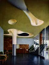 This biomorphic, space-age ceiling was designed by Japanese-American artist and designer Isamu Noguchi, in the building of the American Stove Company, designed by architect Harris Armstrong.