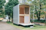 With a footprint of just 106 square feet, this Muji Hut prefab unit by German designer Konstantin Grcic makes a case for tiny, vertical living. The exterior is made from aluminum and wood.