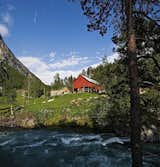 The Juvet is tucked into the woodsy corner of a classic Norwegian farm on the banks of the rushing Valldola River. The farm has existed here since at least the 1500s.