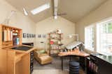 The client initially asked for a garage rebuild, but during construction decided that he wanted to use the new space as a studio instead. The 240-square-foot office was designed so that it could be easily converted back to a garage for a future owner.  Photo 11 of 13 in Garage from Japanese-Inspired Backyard with a Tiny Studio in Portland