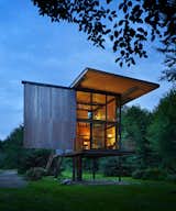 At just 350 square feet, this remote cabin with a view for the Sol Duc River sits on stilts to protect it from flooding and the dampness of the northwestern rainforest. Its shutters can be operated manually by custom steel rods.