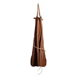 Calf's Leather Kitchen Apron by Malle w. Trousseau, $195 from store.dwell.com

Handmade by French craftspeople, this buttery leather apron proudly wears nicks and stains. The luxurious accessory is a modern take on traditional blacksmith garb.