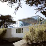 Erik Dyar, who worked under Thodos as a project architect, explains that the pavilion’s program “is expressed as a distillation of the unembellished geometry of the house below.” The addition features custom glass windows and steel doors designed by the architect.  Photo 1 of 8 in A Glass Pavilion With Stunning Panoramic Views Tops This California Home by Caroline Wallis