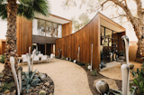 Photo of the Week: Curved Courtyard Full of Succulents and Glass Sculptures