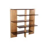 This bookshelf is a reconstruction of Albers's original design, created in 1923 as a magazine stand for his Bauhaus fellow faculty member Walter Gropius. Albers based the shelf width and length to coincide with the square form, and then divided the form into equal horizontal and vertical segments. Solid white oak is used for both the horizontal and vertical components—the horizontal shelves are naturally darkened through oxidization and the vertical pieces are waxed and polished.