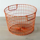 Last but not least, even in the digital age the modern office will inevitably produce trash. The Wire Potato Storage Basket ($36) comes in a vibrant blue or orange; it can just as easily store toys, blankets, or any range of household objects.
