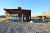 "Weathering steel, concrete, tin, rough cedar, plywood, raw steel plate, and reclaimed fir all have that essential quality and resonate with the features of the Methow Valley," says Ray Johnson, partner at Johnston Architects.