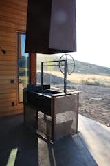This Argentine grill by NorCal Ovenworks is as much a unique talking point as it is a useful tool for summer entertaining.  Search “lillon grill” from A Weathering Steel Retreat in the Foothills of the Cascades