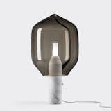 With the Lighthouse lamp, the Bouroullecs experiment with hand-blown glass and an industrially produced base.