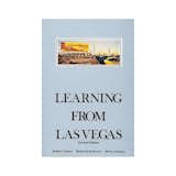 Learning from Las Vegas by Robert Venturi, Denise Scott Brown, and Steven Izenour (MIT Press, 1977).

Controversial when it was published in 1972, this book has proven to be prophetic, tracing the shift of architectural language.