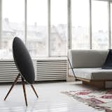 The BeoPlay A9 Speaker cuts an undeniably striking, almost aerodynamic, profile. It comes from the sound experts at Bang & Olufsen and connects to your devices via Apple Airplay, DLNA, or Bluetooth 4.0. It also features built-in access to Spotify Connect, Deezer, and TuneIn.