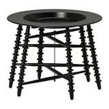 This gothic-inspired table by Ikea features a removable tray to fit your serving needs.