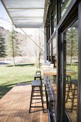 Generous windows and a split indoor-outdoor benchtop help bring the outside in.