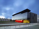 Decq designed the FRAC Bretagne Museum, a reflective glass structure that houses contemporary art, in Rennes, France.
