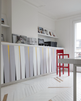  Photo 1 of 1 in Photo of the Week: Minimal Paris Apartment Accented by Fun Pops of Color