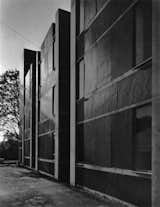 Erdman Dormitory at Bryn Mawr College, in Bryn Mawr, Pennsylvania, by Louis Kahn

"Byrn Mawr is a womens' college but I managed to spend a lot of time there when I was attending Haverford right down the road. Kahn's Erdman dormitory is a concrete castle with a simple plan made of three rotated cubes. You enter the building on a corner of the middle instead of along a flat section of wall. That simple move completely rewires the experience of the building inside. The rooms are on the periphery and there is a large open space at the middle of each cube. Its a powerful building made more so by relying on natural light, concrete, and simple geometric forms." —Architect Noah Walker, who designed a Hollywood bachelor pad featured in Dwell's March 2012 issue.