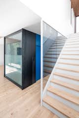 Enfer Design also crafted the maple stairs and the adjacent hot-rolled steel window encasing.   from All Steeled Up