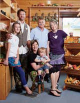 Lark Toys owners Ron and Kathy Gray (standing), their daughter Miranda (seated) and son-in-law Scott Gray-Burlingame, granddaughter Gwendolyn (Wynnie), age 12, and grandson Murdock, age 2.  Photo 2 of 7 in In Minnesota, a Family Business Thrives Making Homespun Toys by Hand