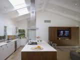 “Skylights were introduced throughout the home to increase light without decreasing privacy,” Montalba said. A Bosch 36-inch, five-burner gas cooktop and a Miele refrigerator add a stainless steel contrast to the kitchen’s white aesthetic.