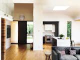 A series of “ad-hoc additions,” as Young refers to them, gave the original home a confusing layout. The renovation unified it with details like white oak flooring.